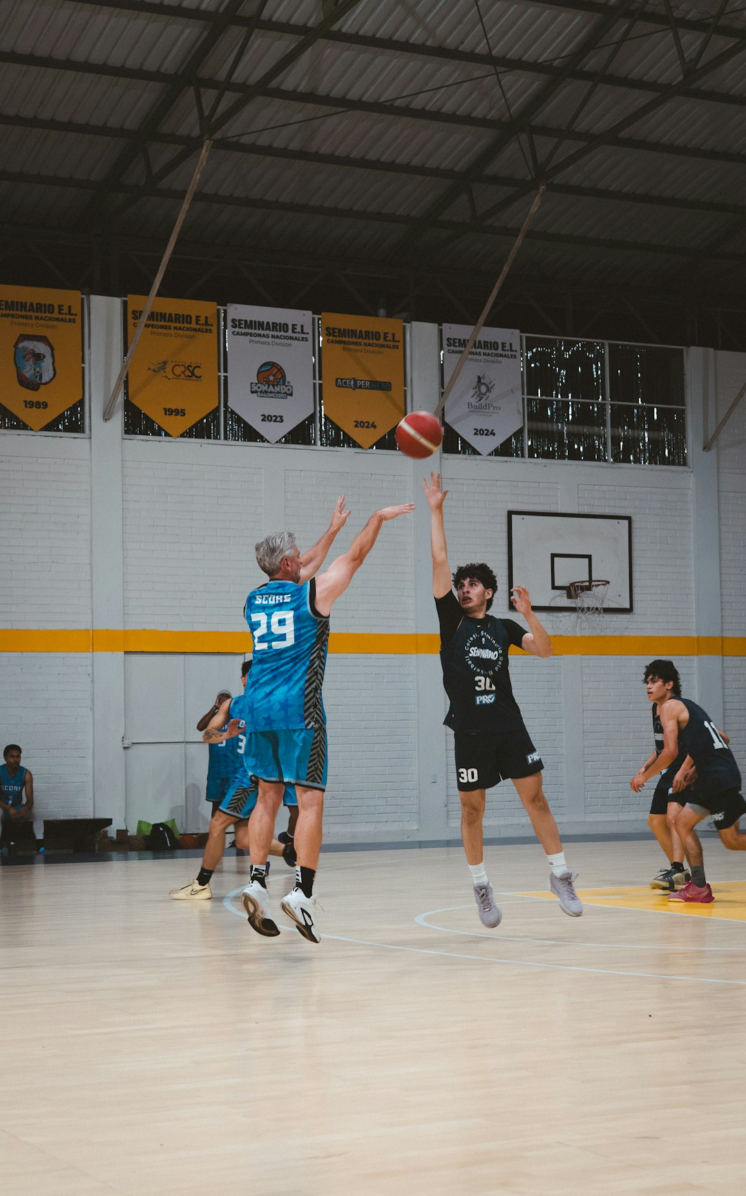 Shooting photos and shooting hoops on the first night of our Costa Rica missionary trip